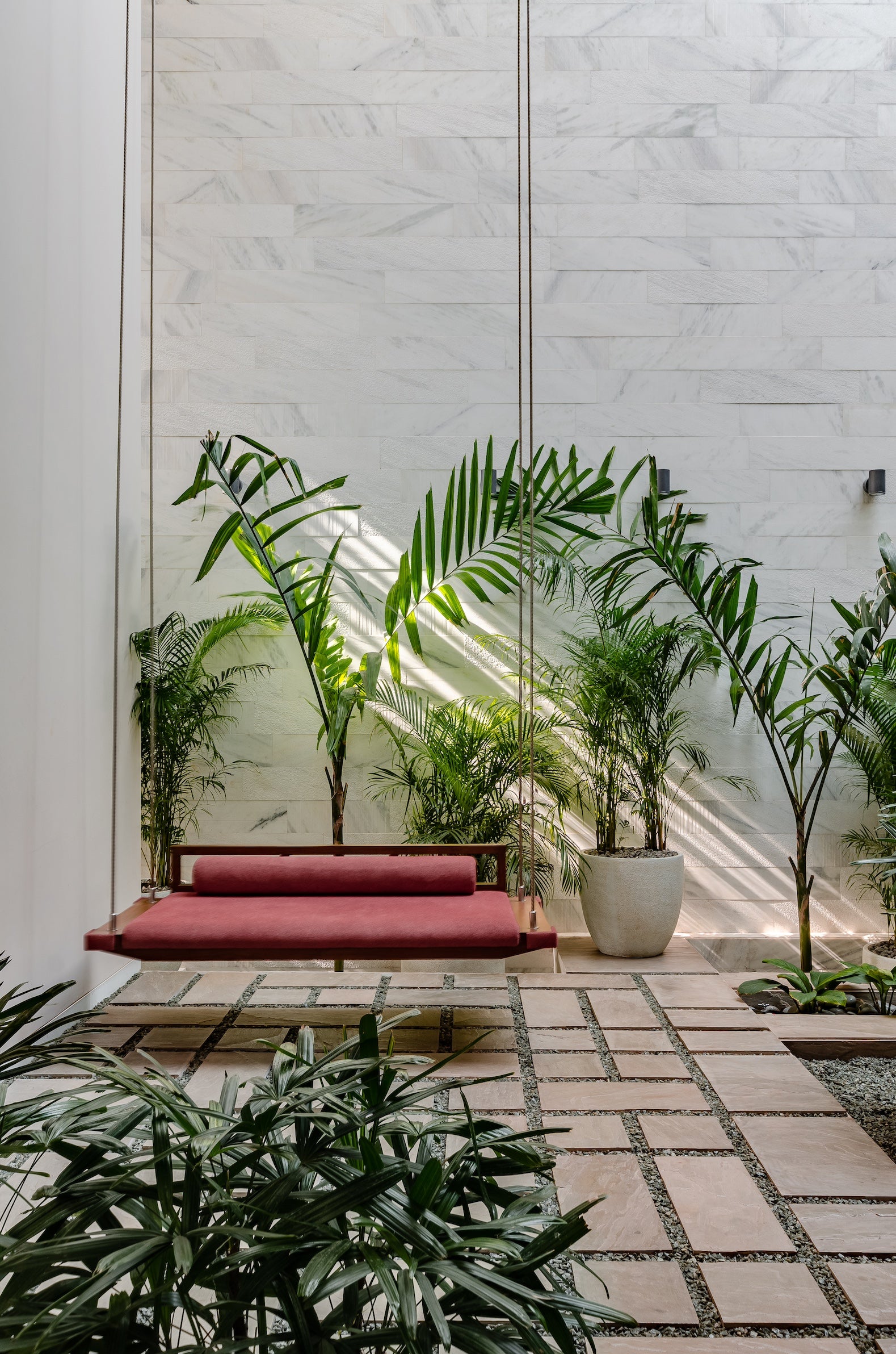Modern home with Outdoor Swing - Furniture design by Maanavi Homes