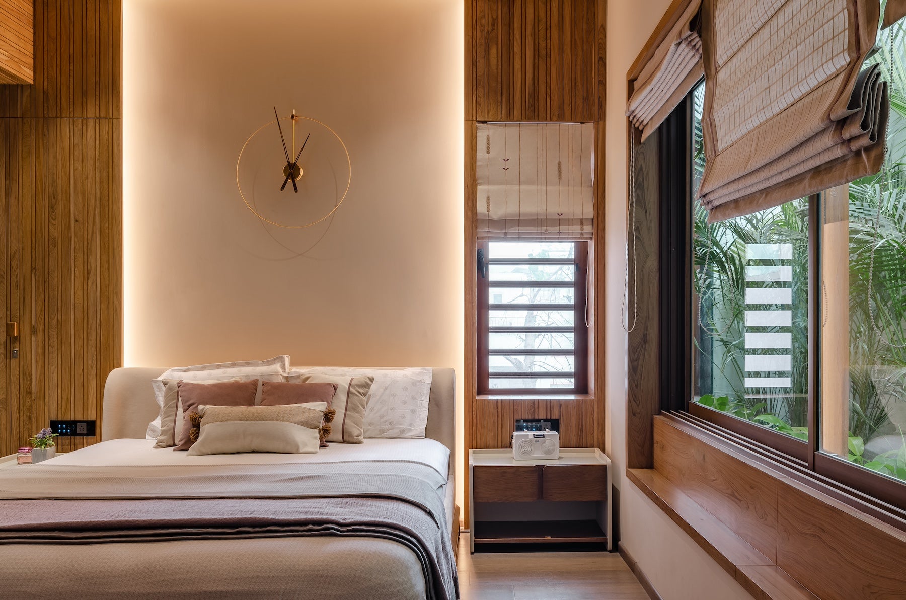 contemporary master bedroom with luxury bedding