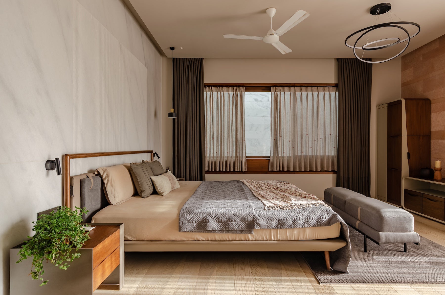 luxury modern bedroom with Wooden Furniture design - Maanavi Homes