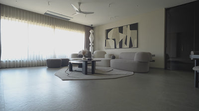 Modern and Minimalistic living room, and dining room with wooden dining table - Furniture manufactured by Maanavi Homes